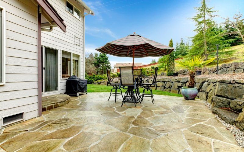 Outdoor patio with table and chairs