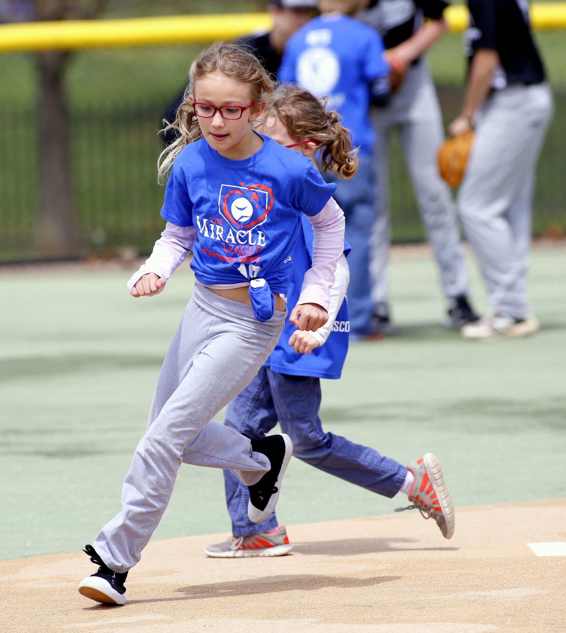 Miracle League of Montgomery County athletes playing baseball