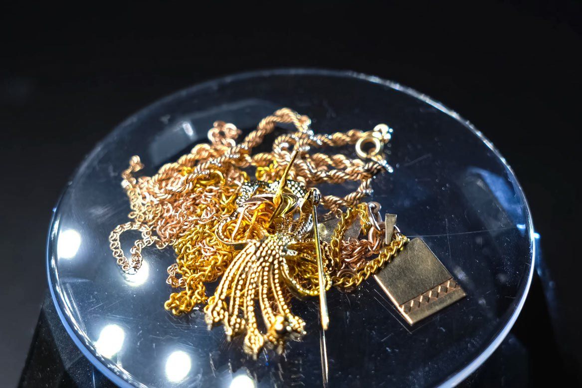 Gold Jewelry on Electronic Scales — Laredo, TX — El Bufalo Pawn Shop