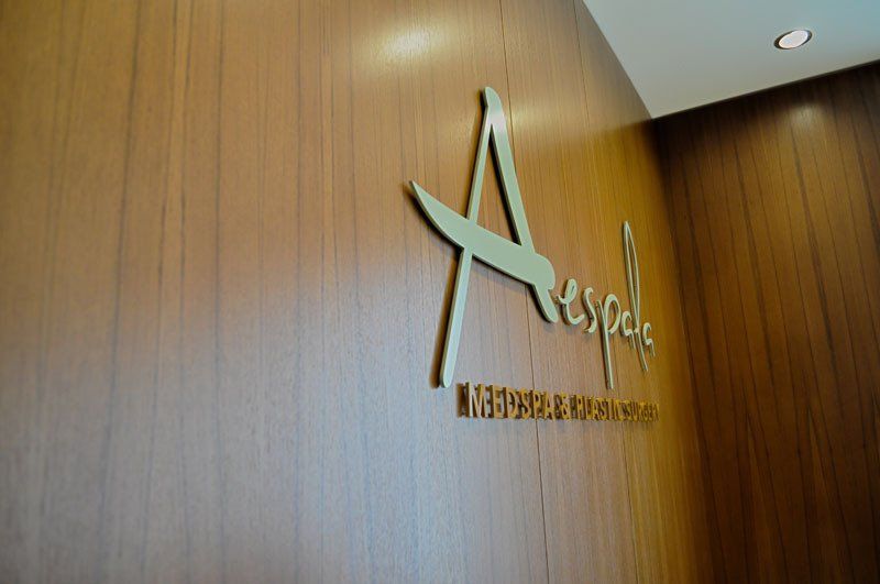 A wooden wall with the letter a on it