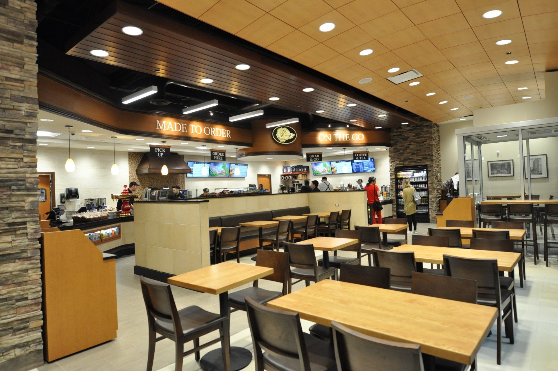 A restaurant with lots of tables and chairs