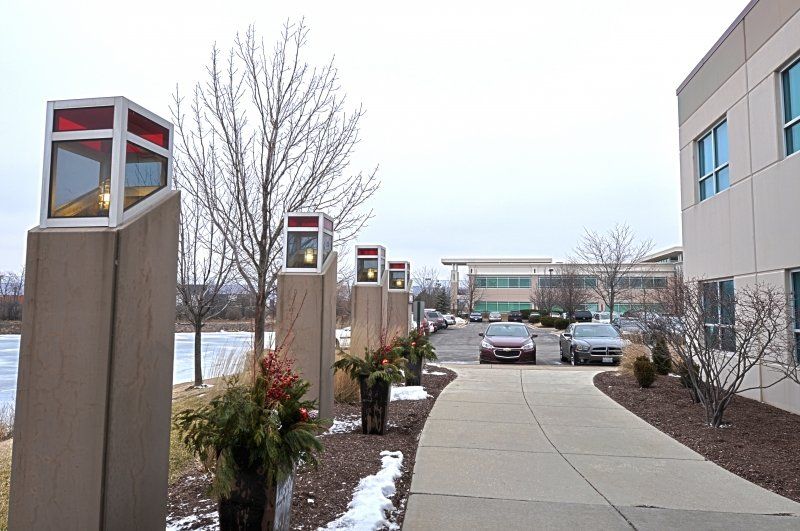 A row of telephone booths in front of a building