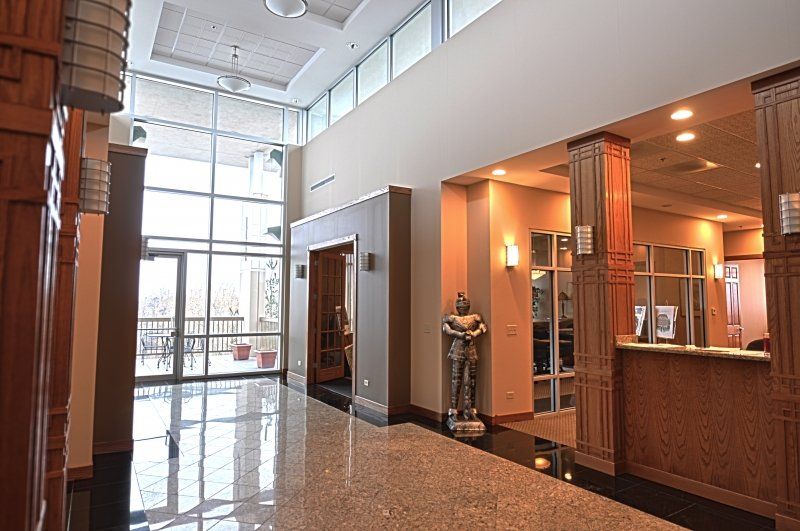 A large lobby with a statue in the middle of it