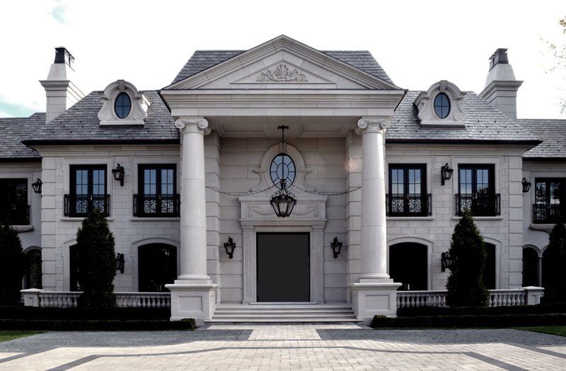 A large white house with columns and balconies