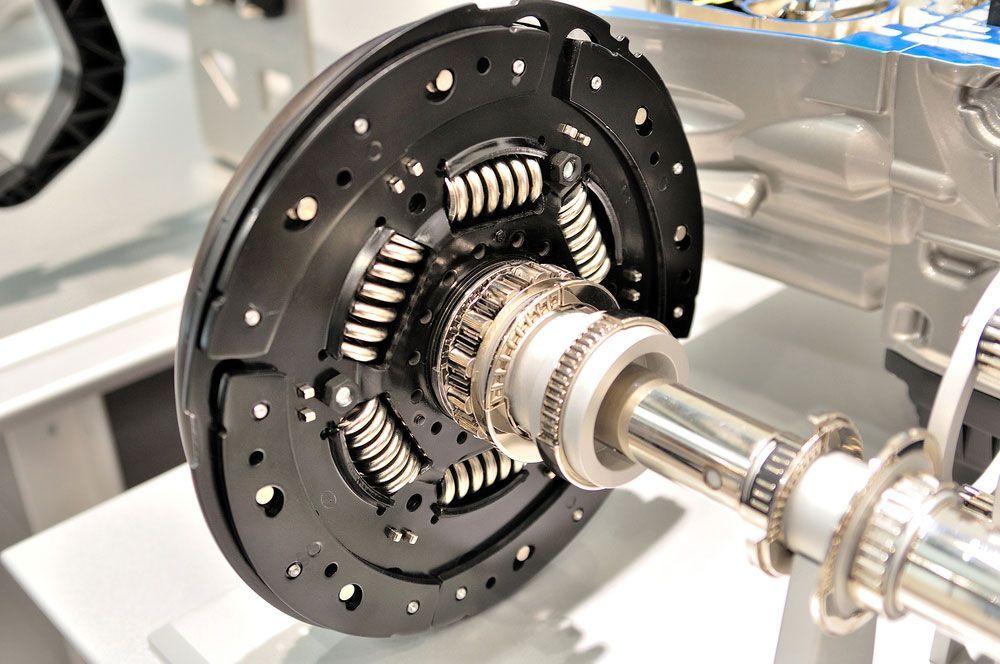 Clutch Plate Positioned on an Axle — Lavington Auto Electrical in Lavington, NSW