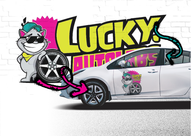 A white car with a Lucky Auto Labs logo featuring a cat holding a tire | Lucky Autolabs