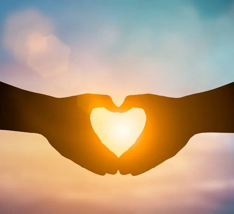 Hands Forming A Heart With Sunset In Background — Serene Therapy with Lana In Paddington, NSW