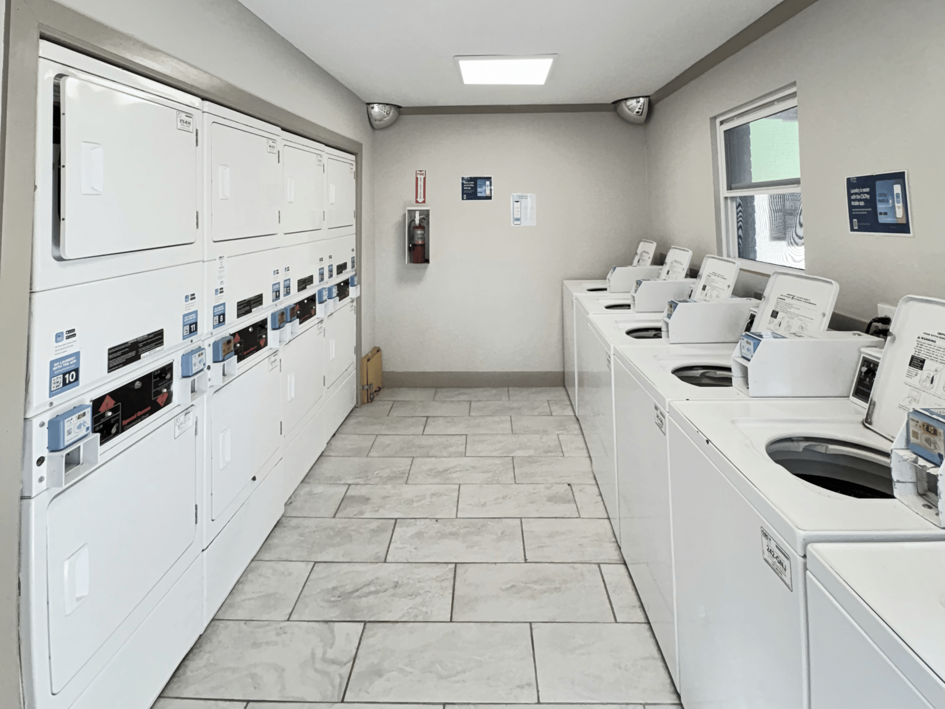 Laundry room with white appliances 