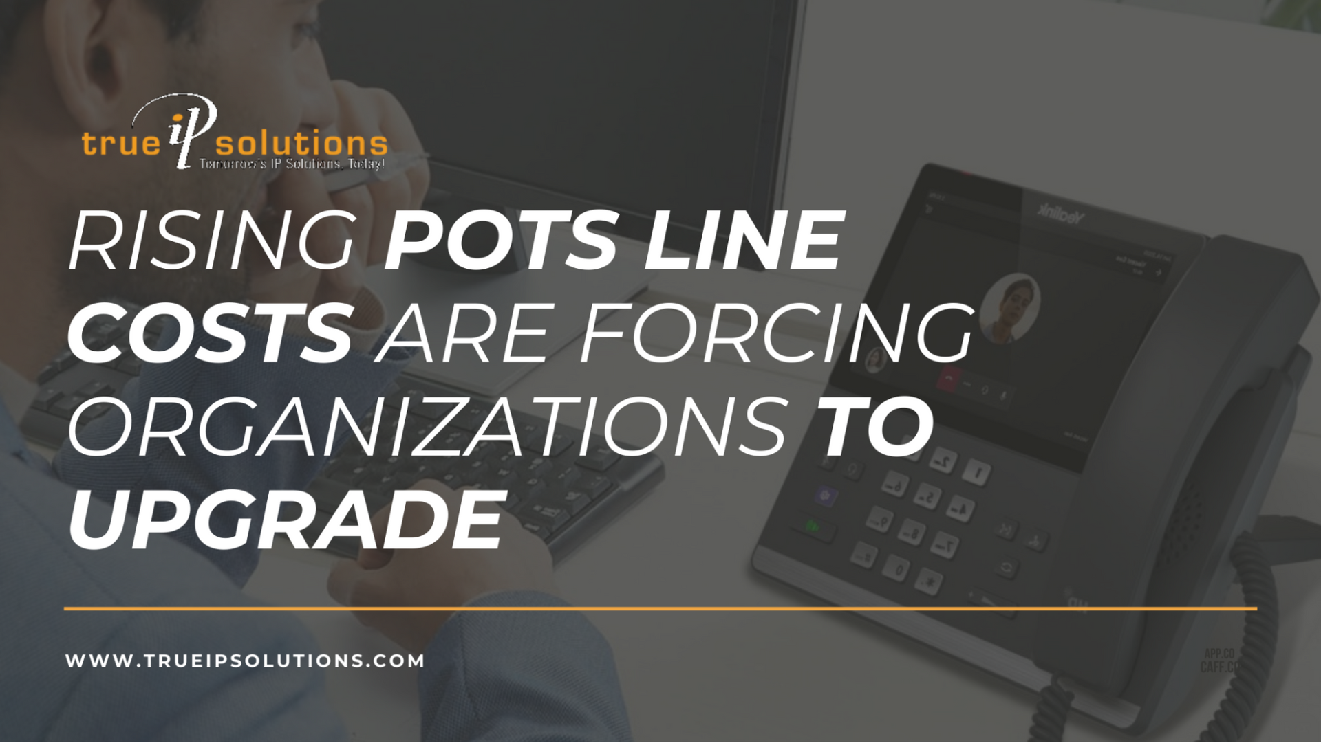 Man using a desk phone; text reads: 