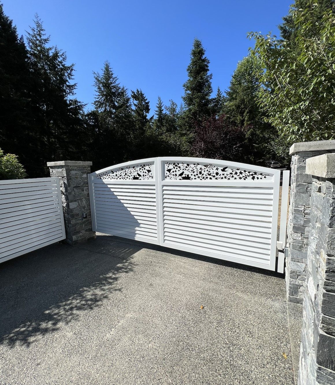 white powder coated 2 panel automated metal driveway gate