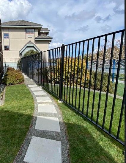 Wrought Iron Fence surrounding a residential home