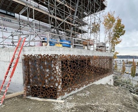 custom architectural metal work on facade of concrete building