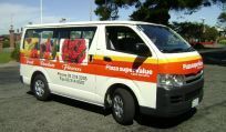Van with printed signage in Otago