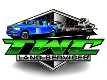 Blue truck towing equipment, TWC Land Services logo in green and black.