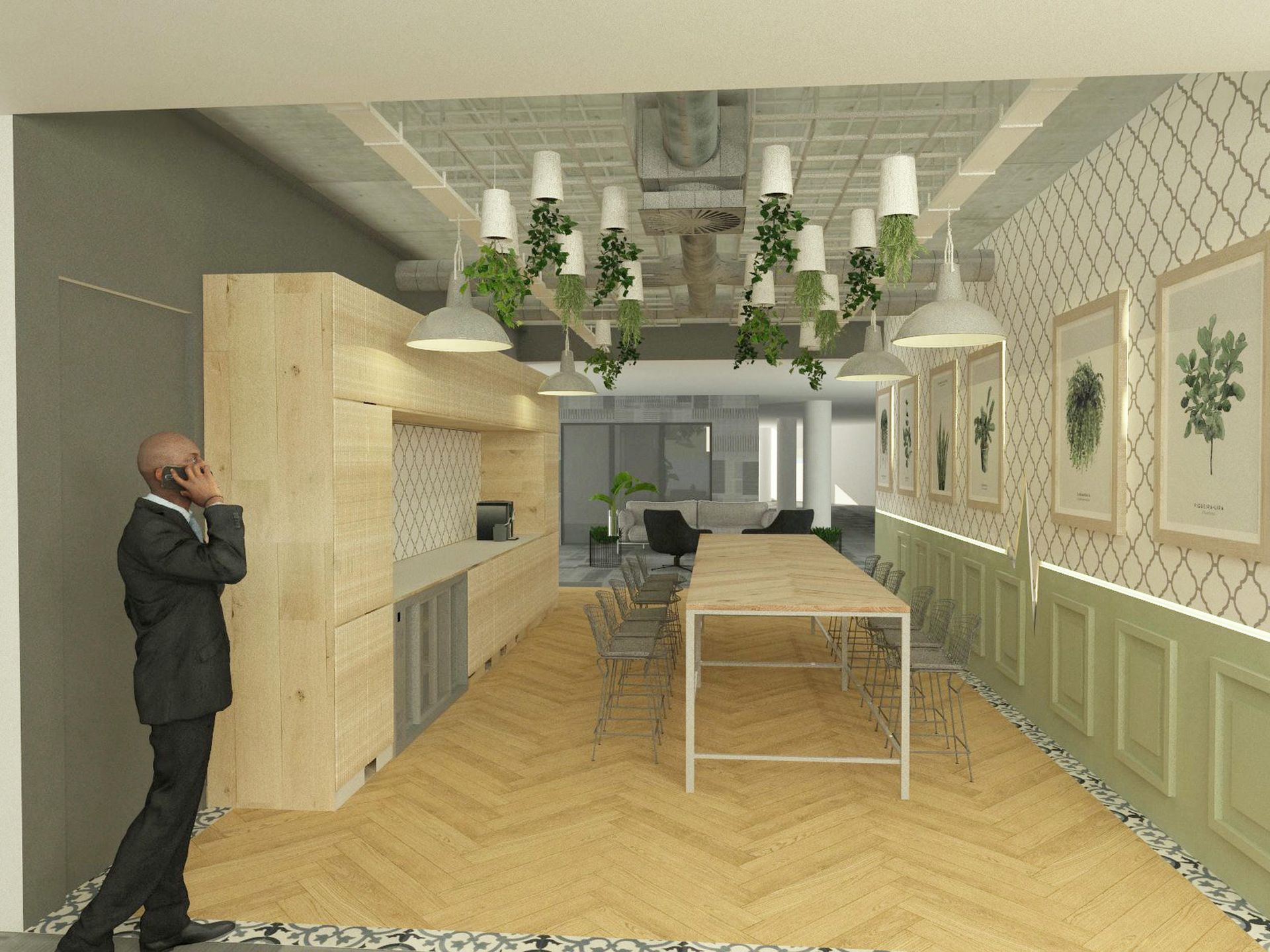 A man in a suit is talking on a cell phone in a room with a long table