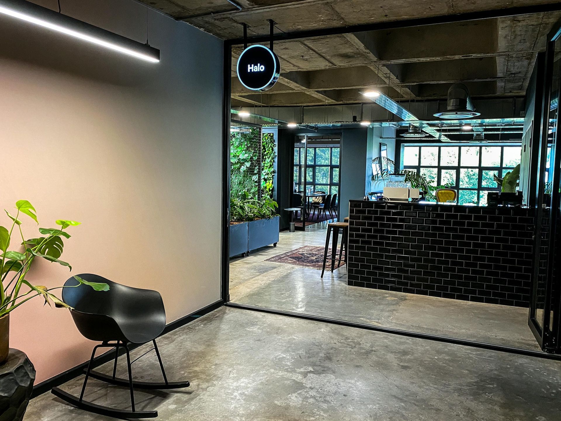 There is a rocking chair in the middle of the room.