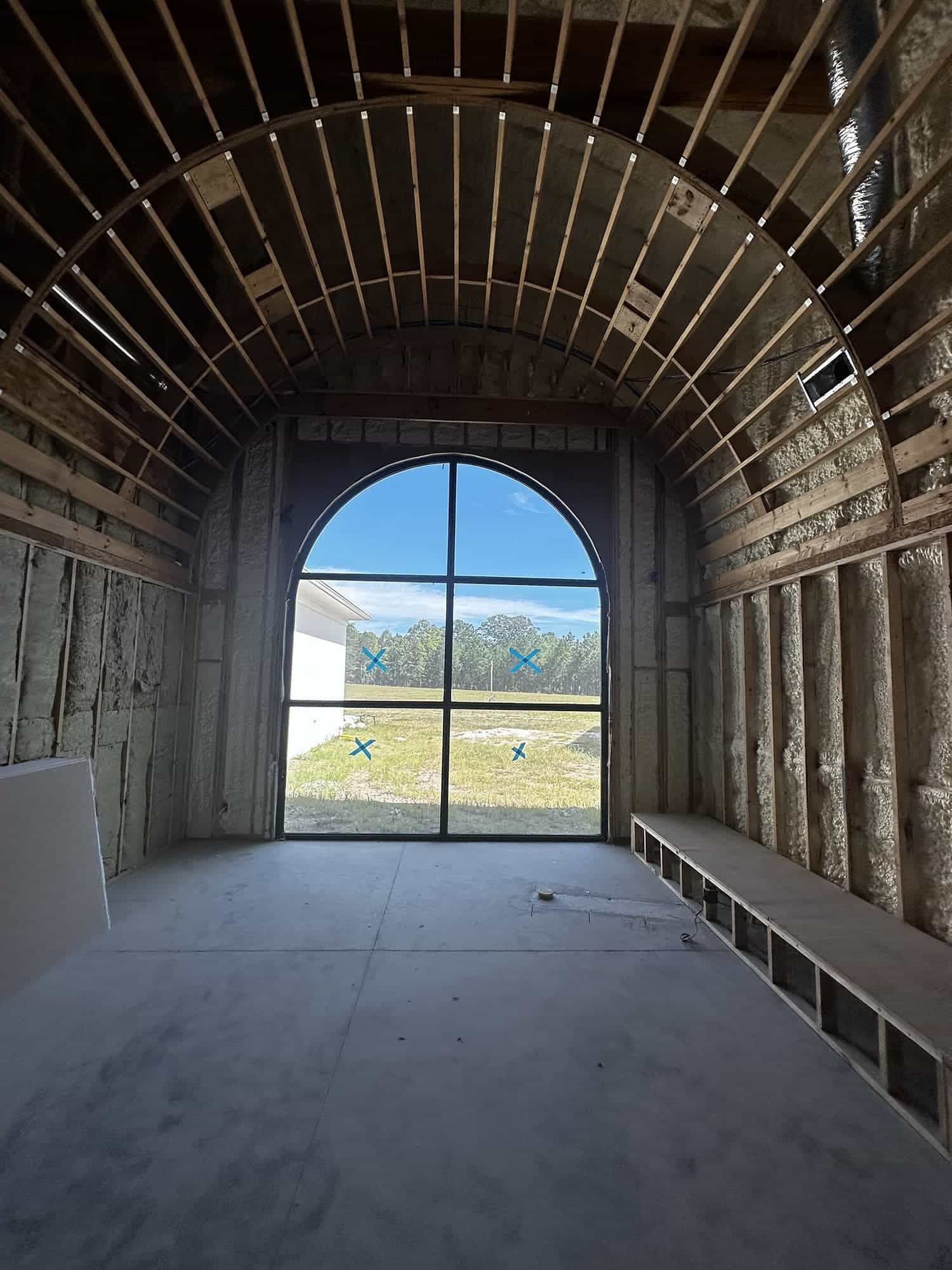 There is a large window in the middle of the room.