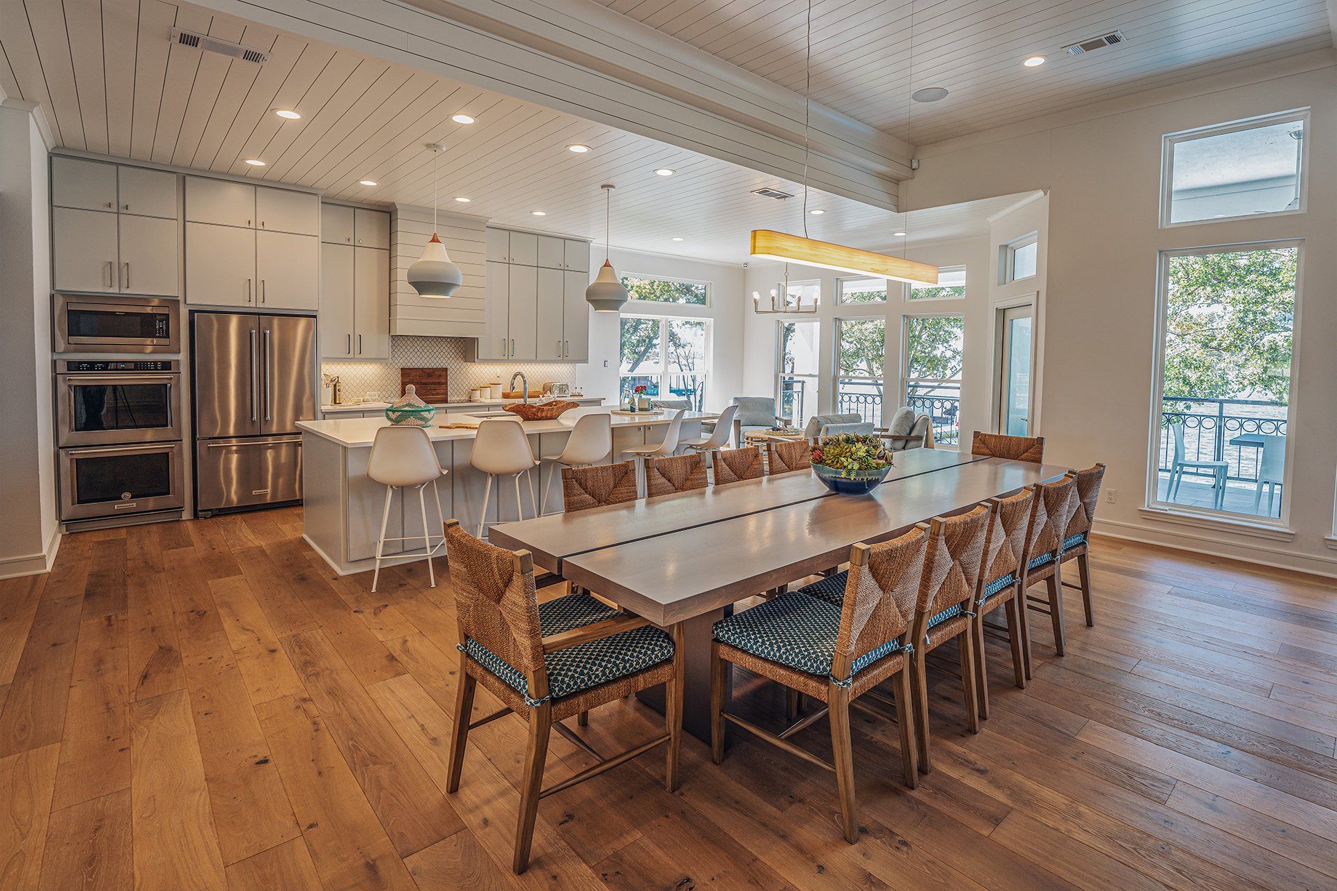 There is a long table in the middle of the room.