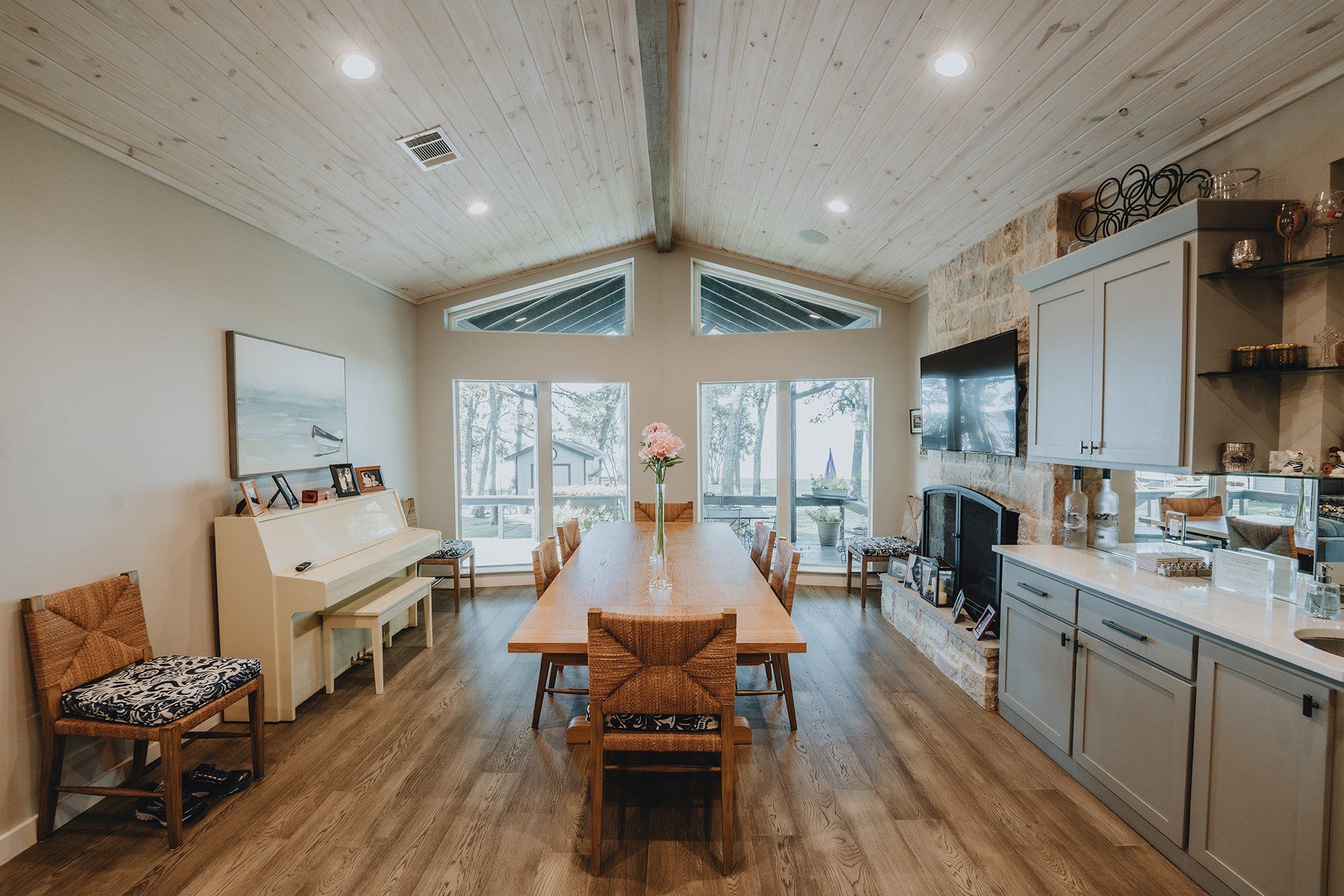 There is a long table in the middle of the room.