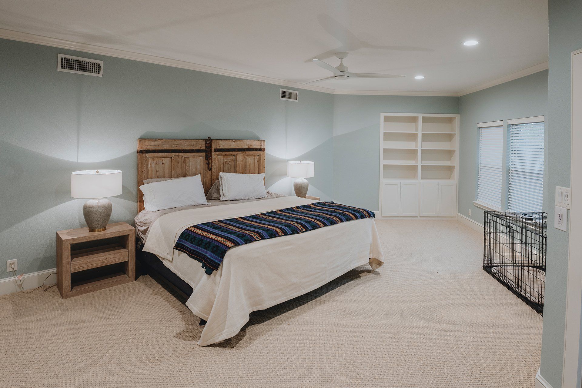 There is a large bed in the middle of the room.