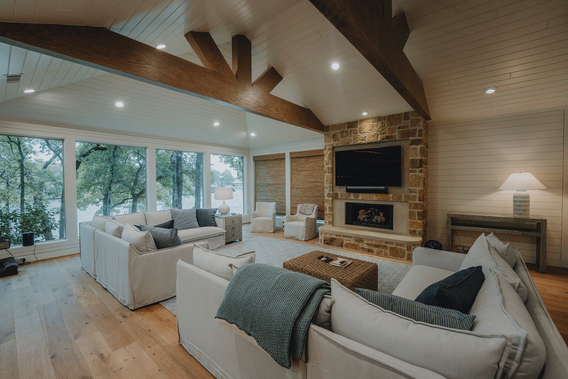A living room filled with furniture and a television.