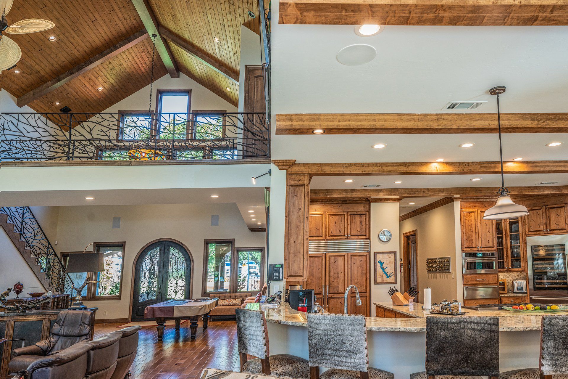 A large house with a kitchen , living room , and dining room.