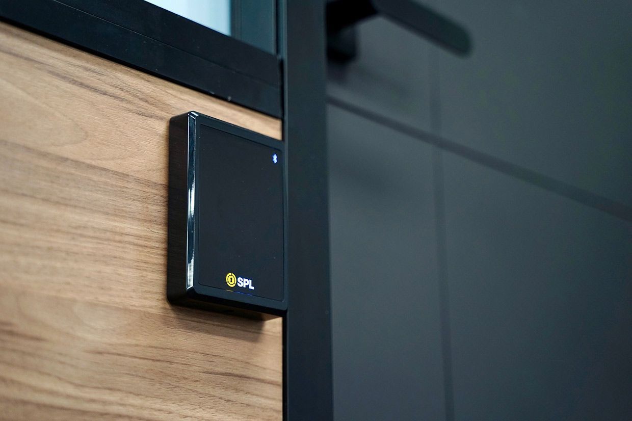 A Close Up of a Black Box on a Wooden Wall — SPL Security Solutions In Southport, NSW