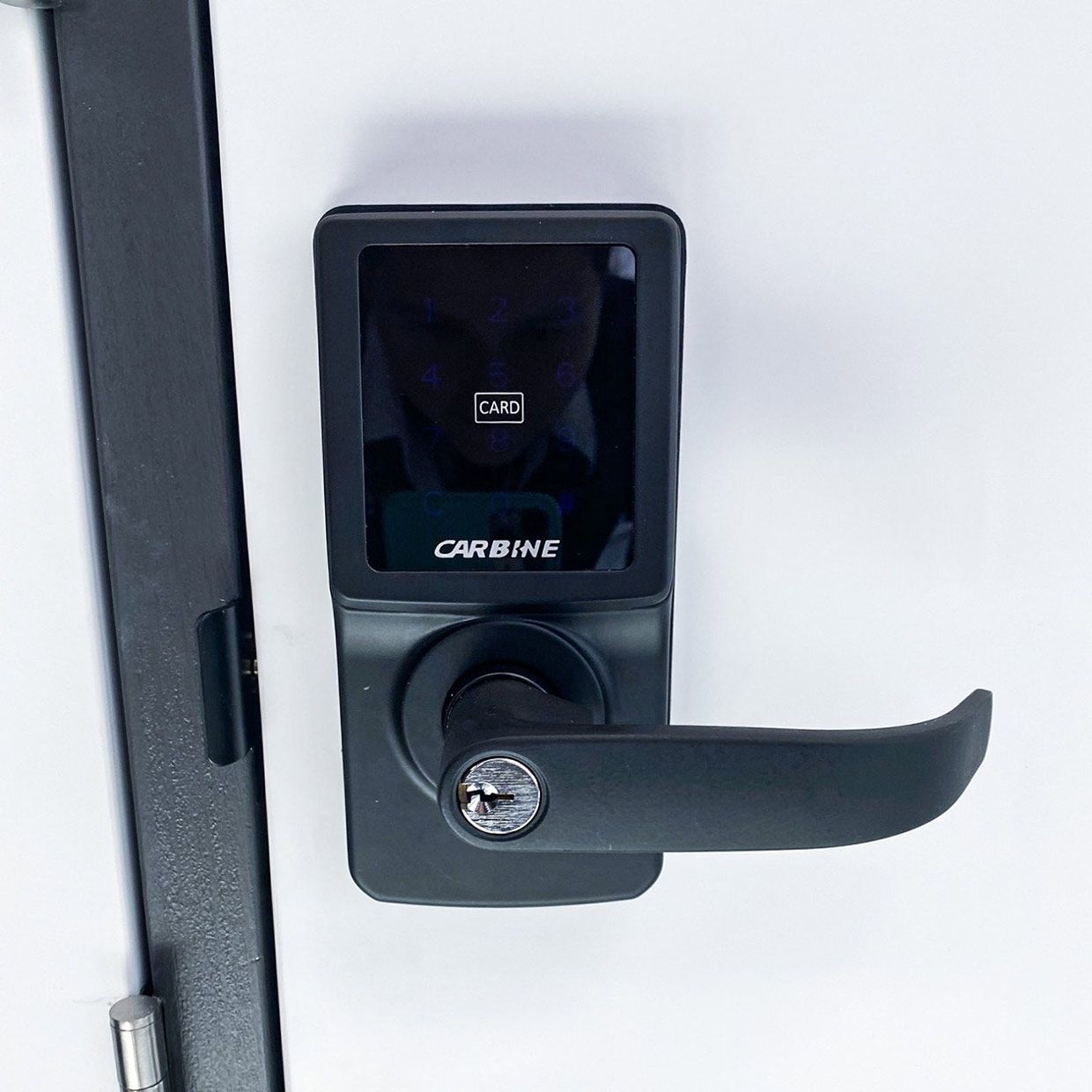 A Carbine Door Lock is Sitting on a White Surface — SPL Security Solutions In Tweed Heads, NSW