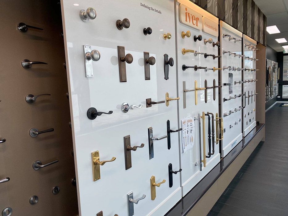A Wall Filled With Lots of Different Types of Door Handles — SPL Security Solutions In Hope Island, QLD