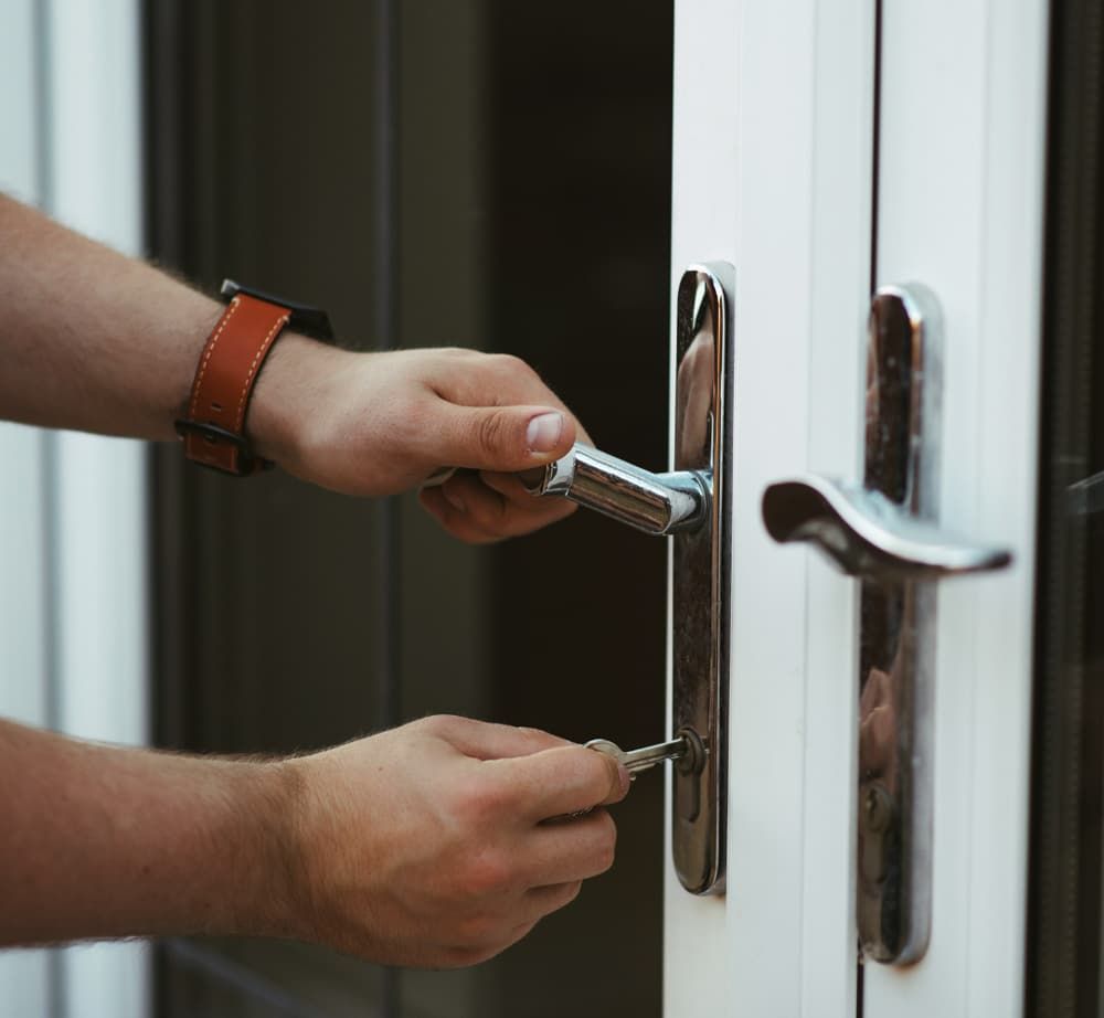 Close Up of Locksmith Unlocking Door  — SPL Security Solutions In Bundall, QLD