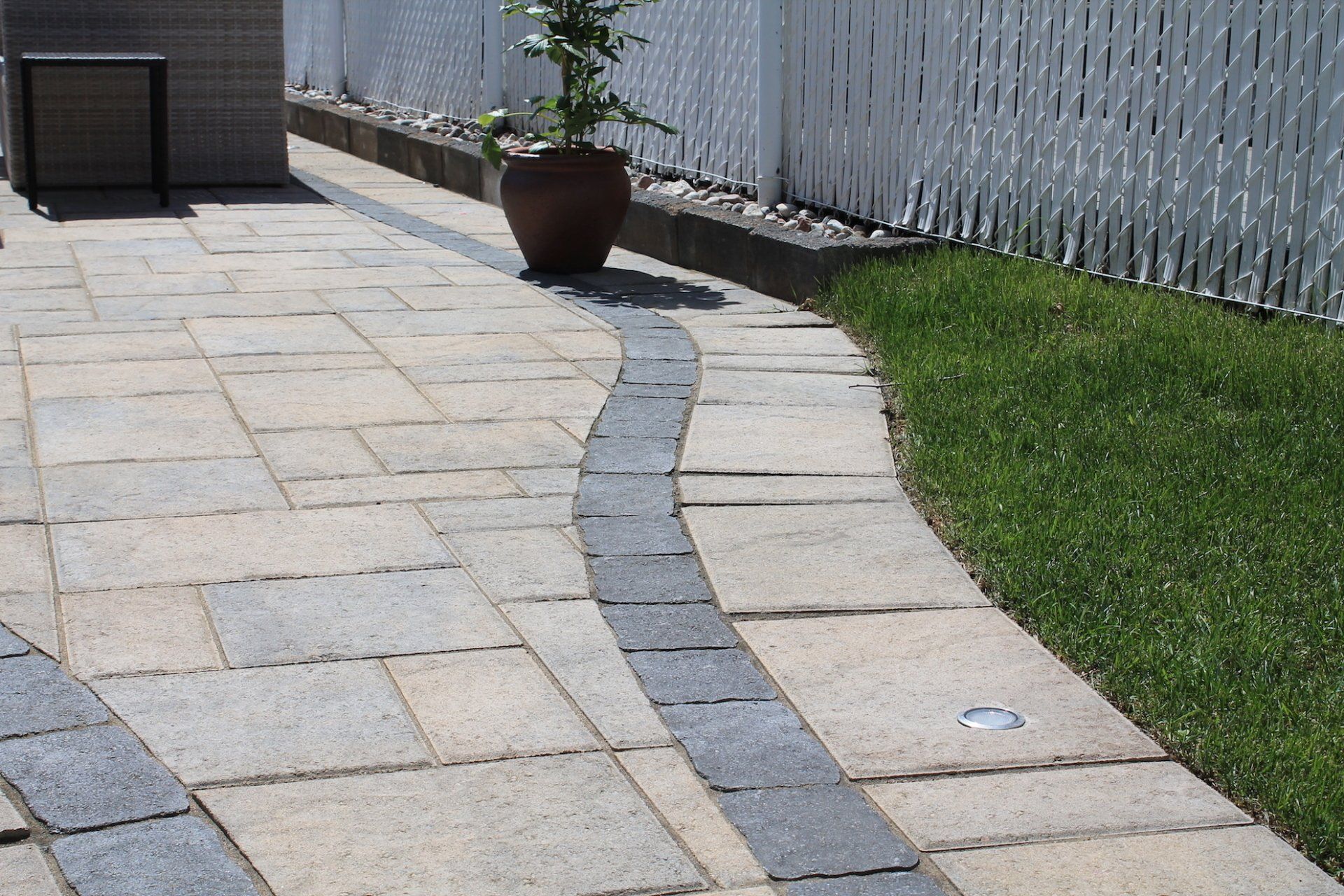 grey and beige unistone in backyard