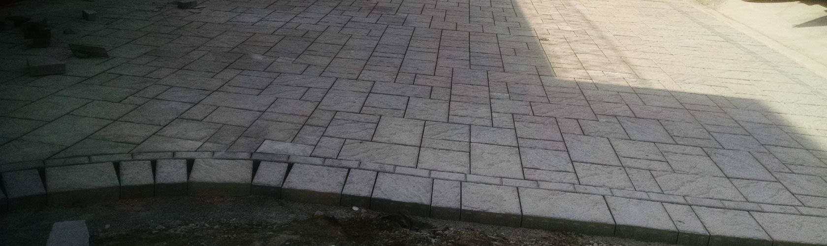 grey newly done unistone parking lot