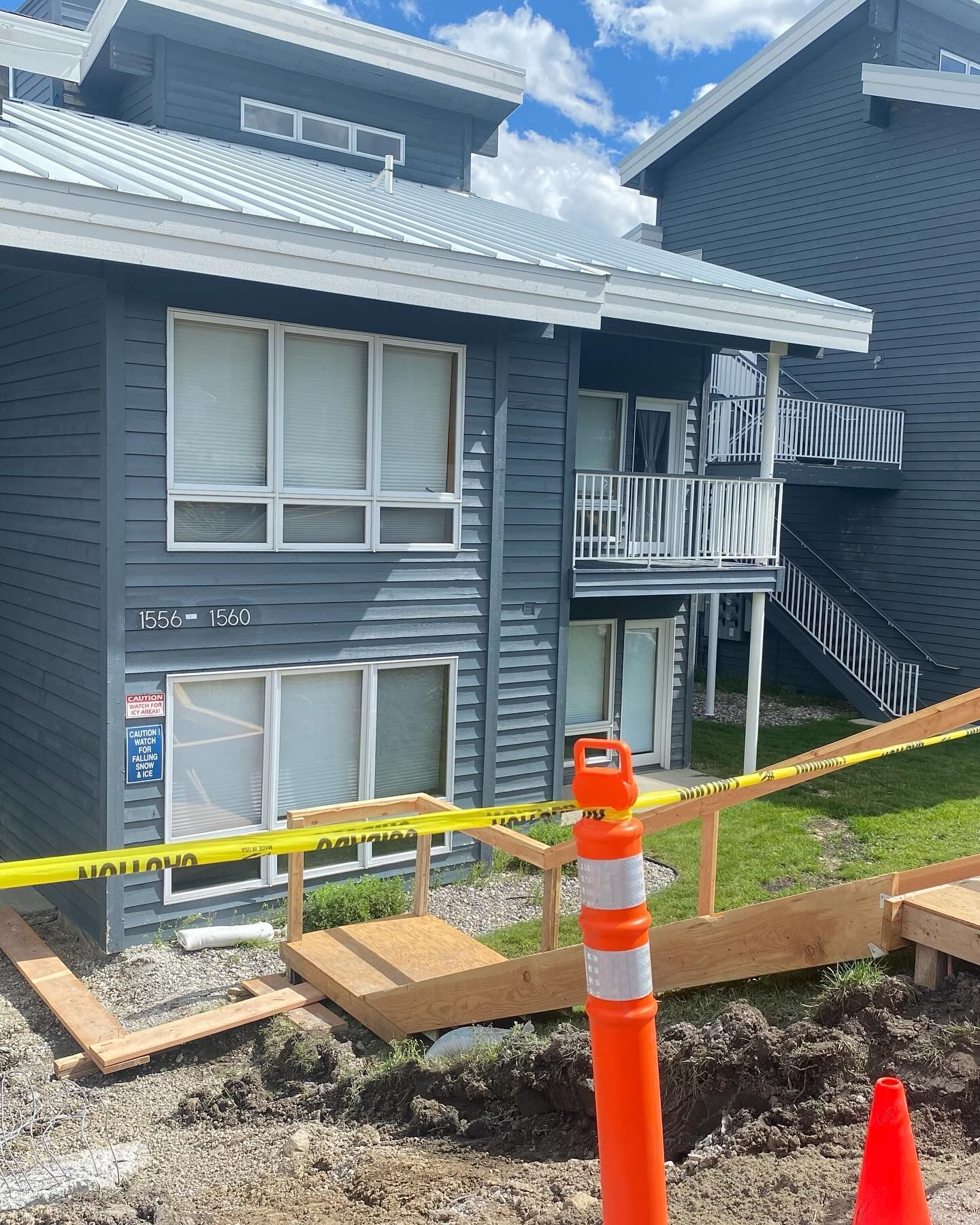 A building with a lot of windows is being remodeled.