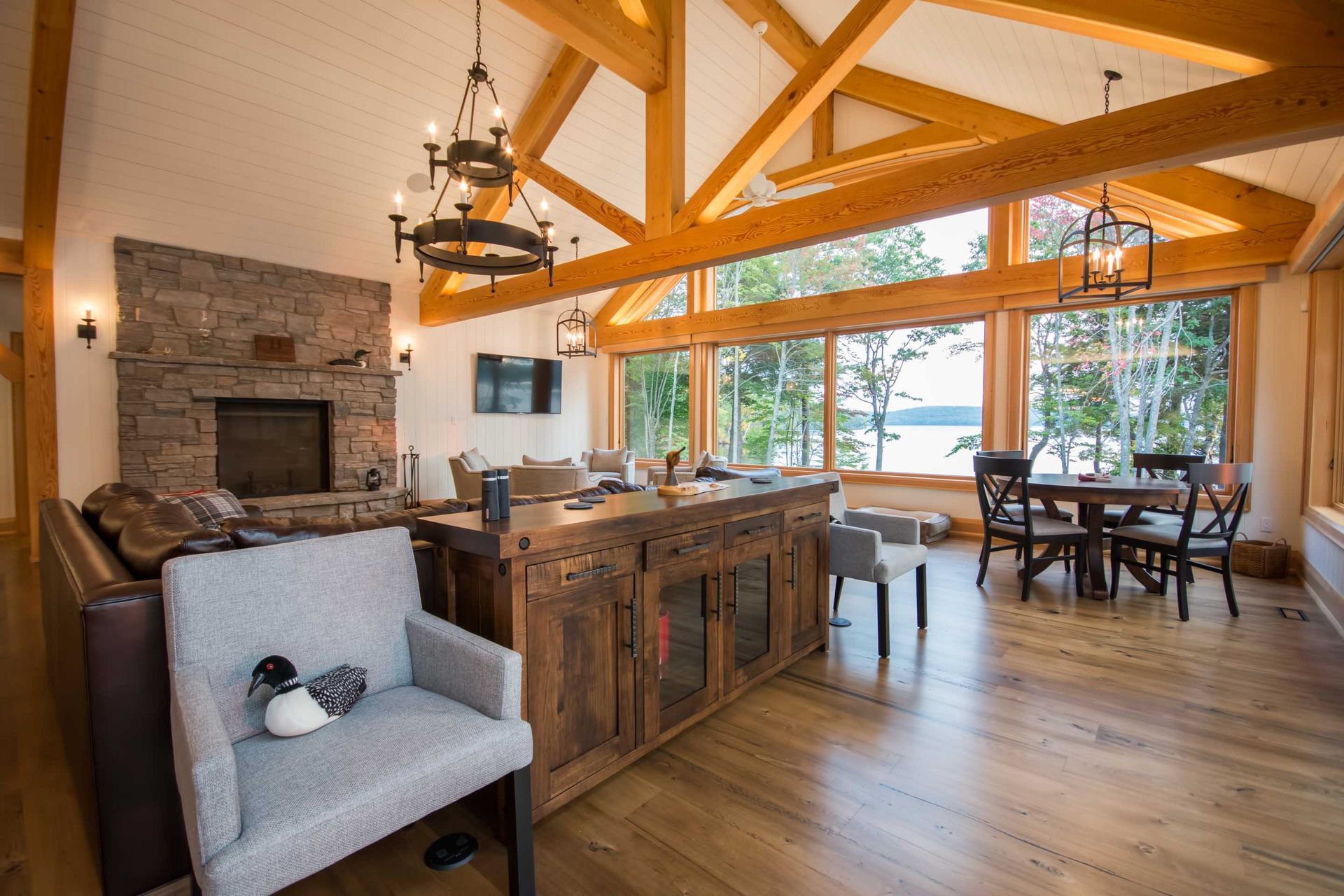 A living room filled with furniture and a fireplace.