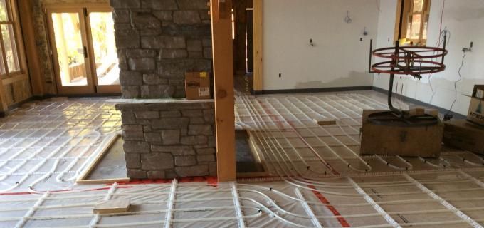 There is a fireplace in the middle of the room.
