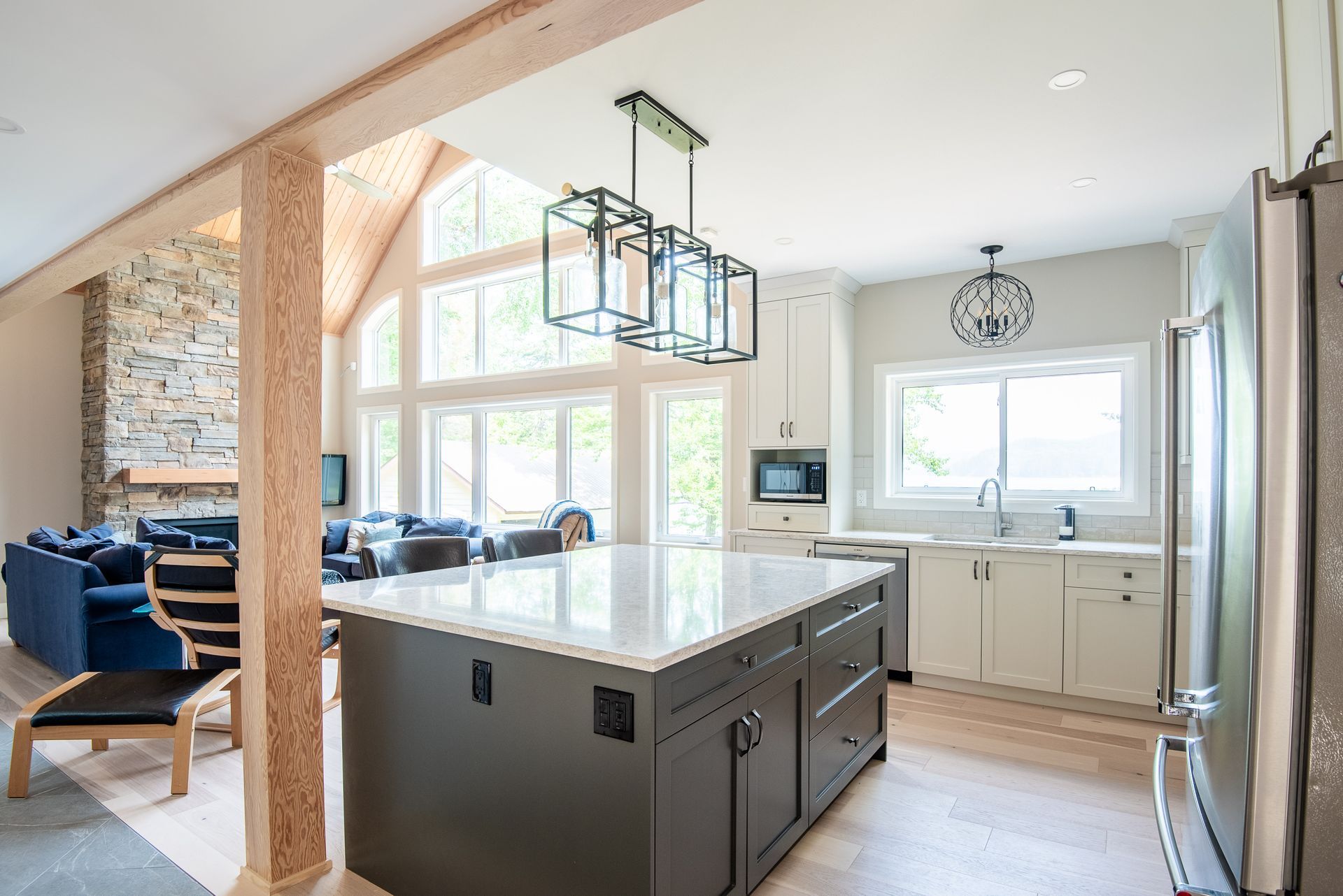 There is a large island in the middle of the kitchen.