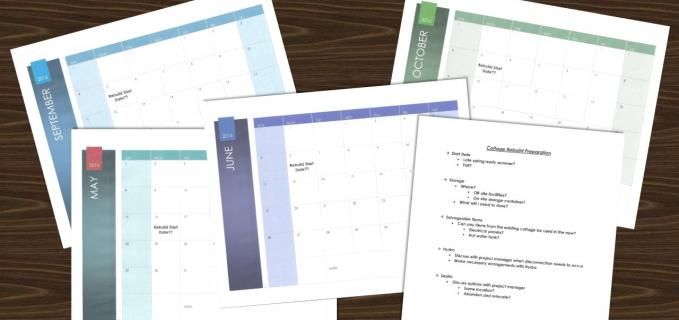 A bunch of calendars are sitting on a wooden table.