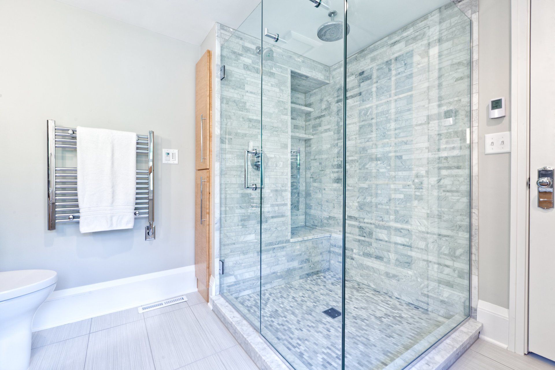 frameless shower door and enclosure with tile back splash