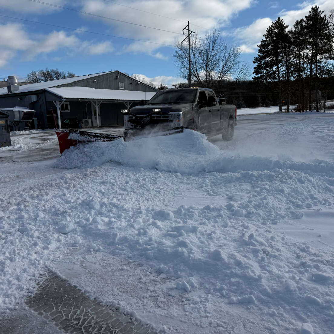 Image of a driveway in Eau-Claire that needs snow removal.
