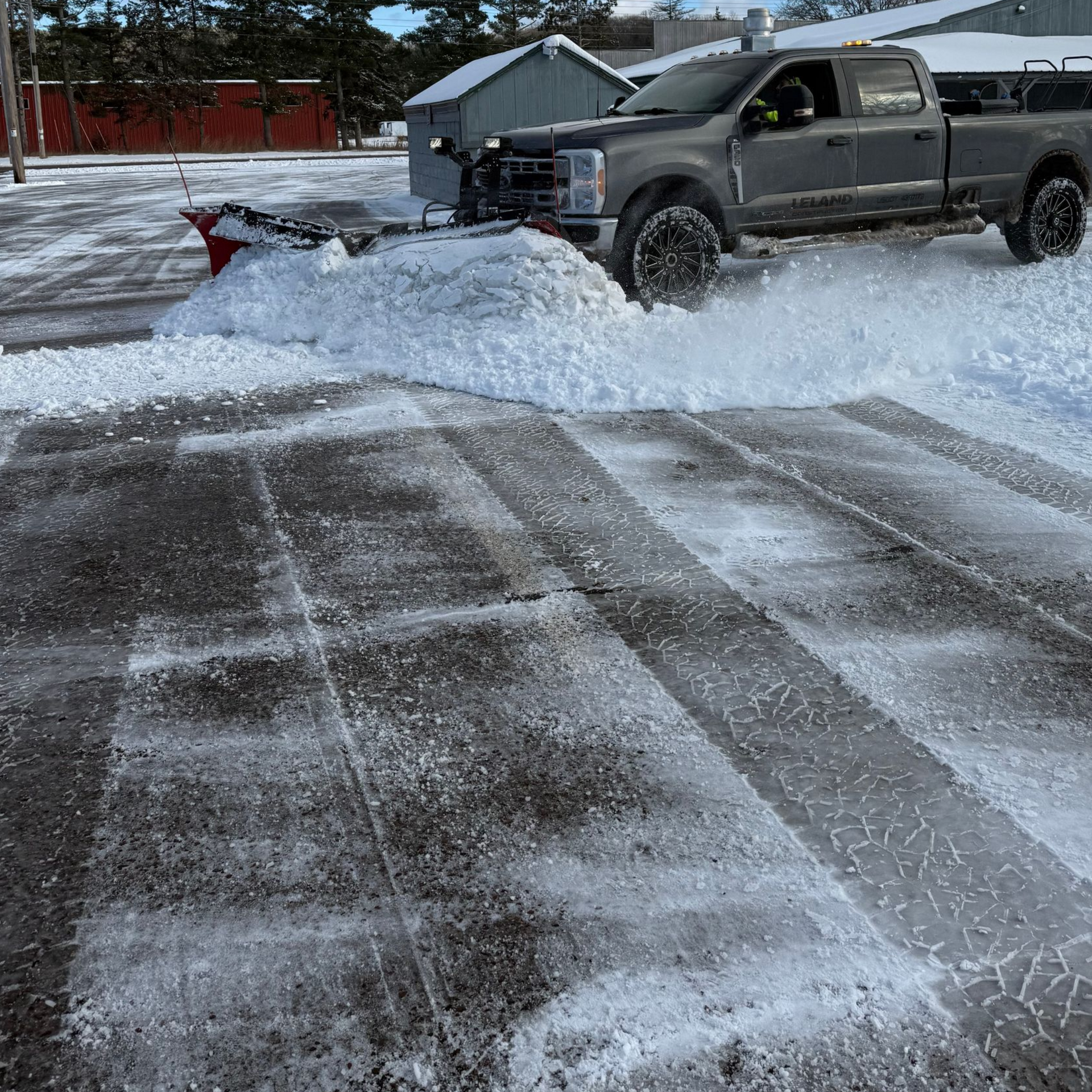 Picture of a one time snow removal service done by snow removal contractors Leland Construction & Concrete