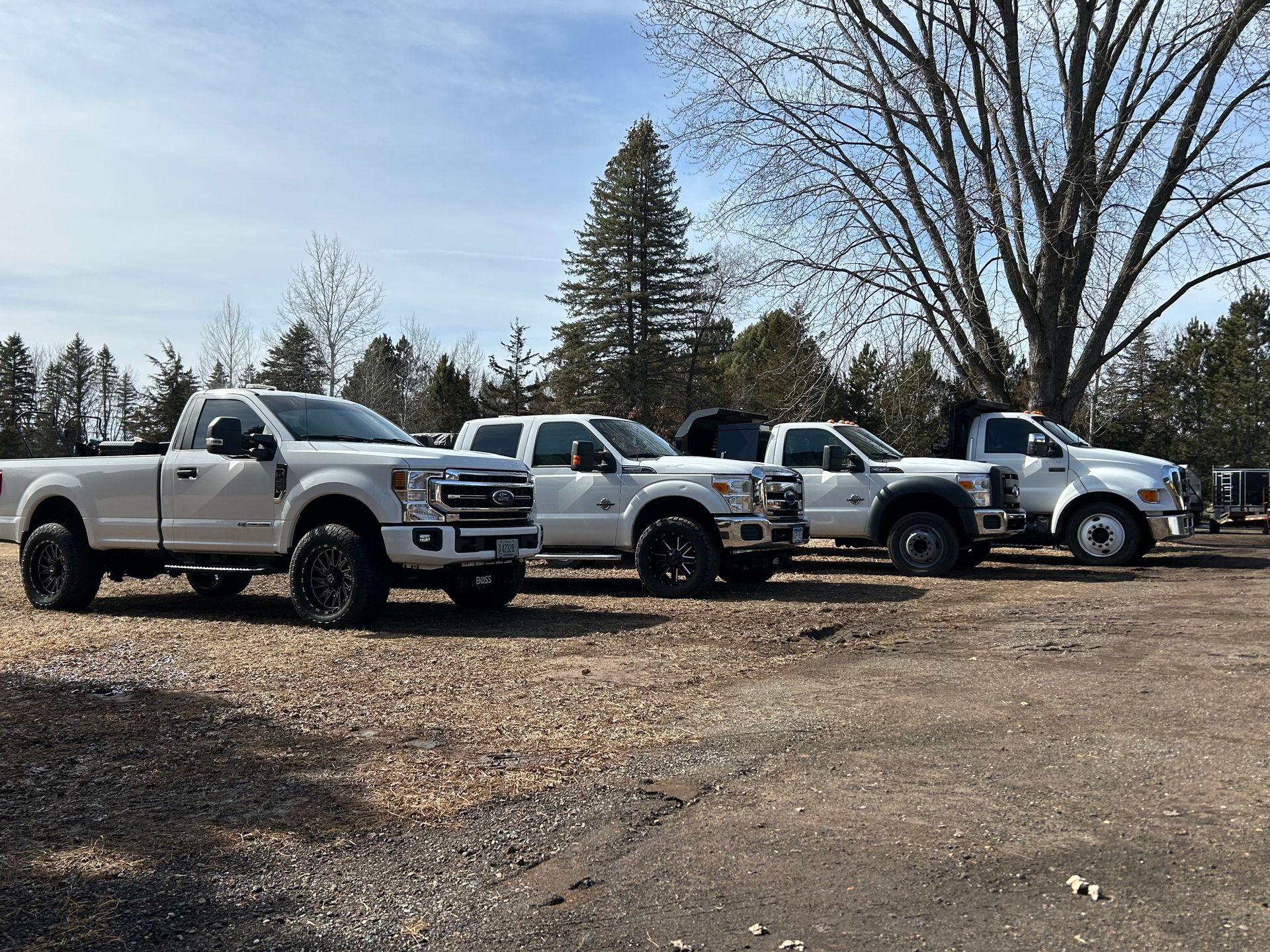 Picture of Snow Plowing and Snow Removal Trucks parked.