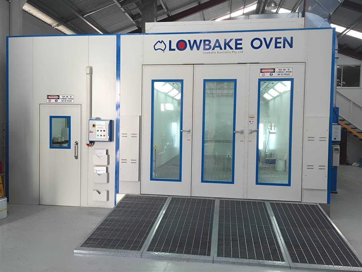 A Lowbake Oven Is Sitting Inside Of A Building — Milini's Panel, Paint & Towing in Tully, QLD