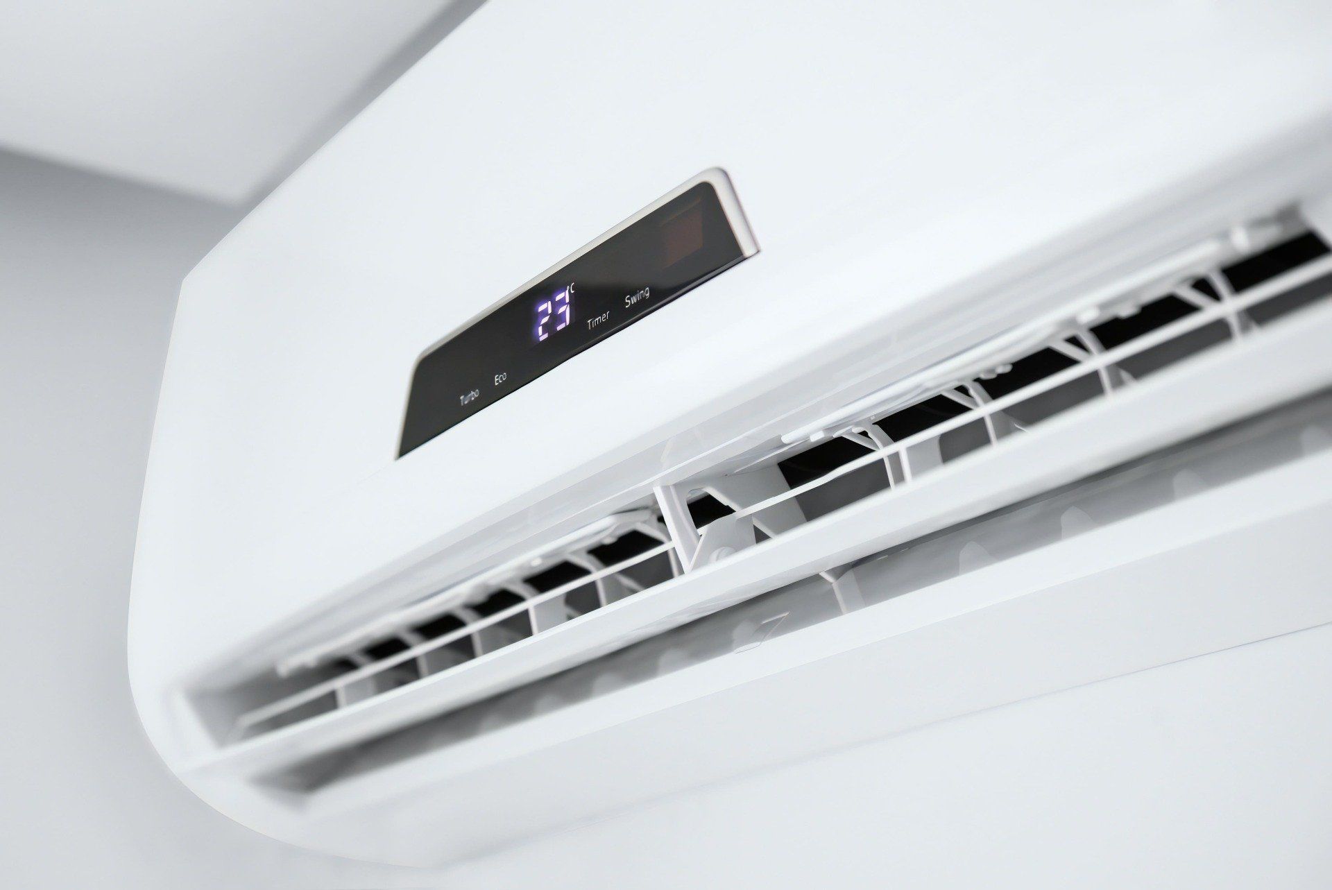 Split Air Conditioner On A White Wall — More Clean Air In Cessnock, NSW