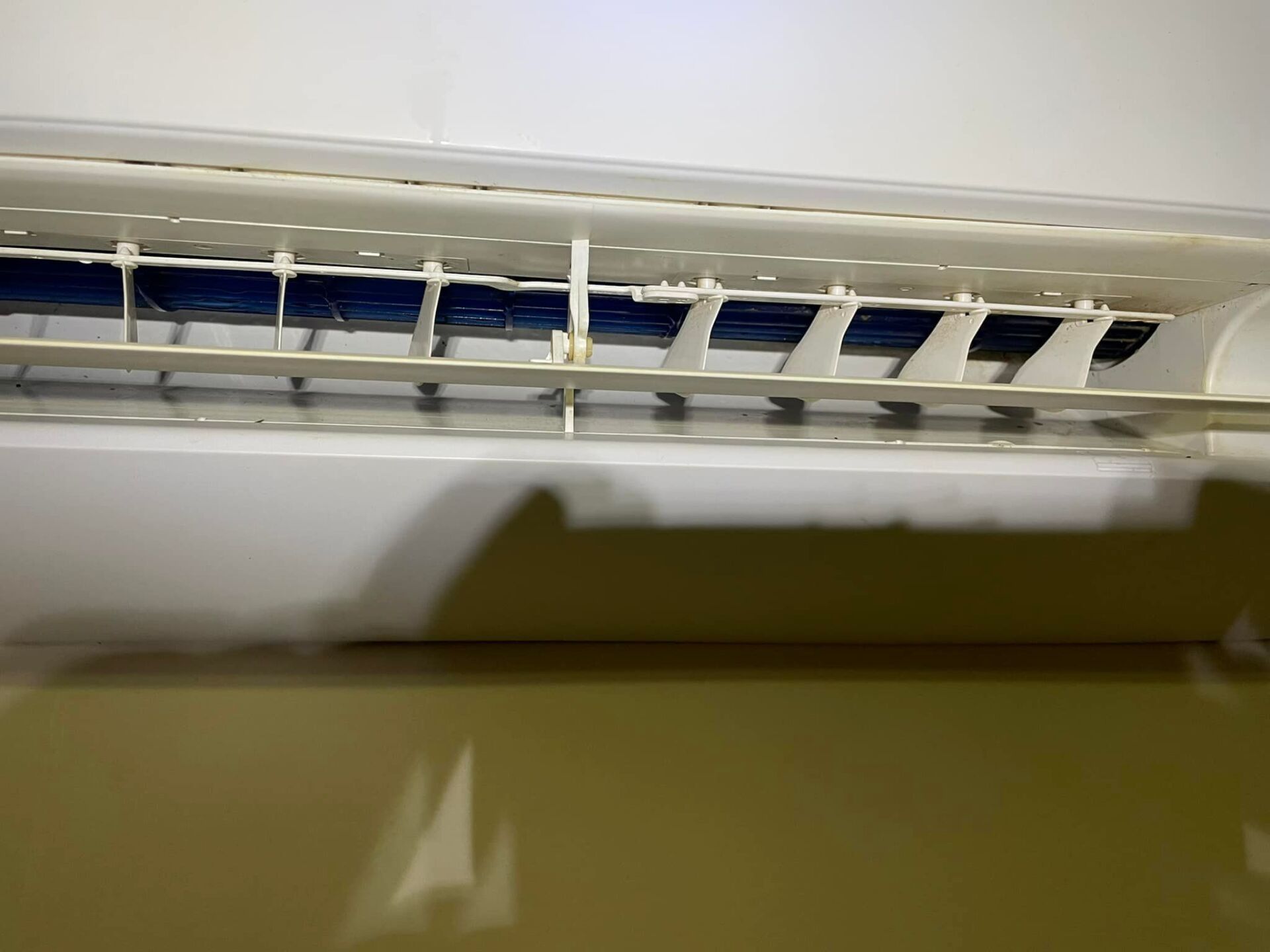 A Close Up of a White Air Conditioner on a Wall — More Clean Air In Cessnock, NSW