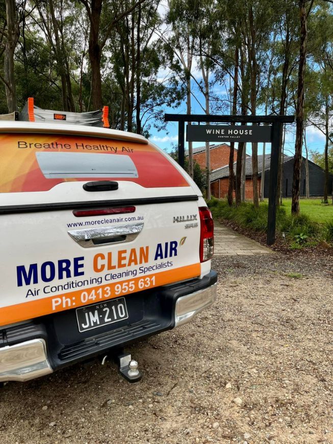 Company Car That Is Parked On A Gravel Road — More Clean Air In Cessnock, NSW