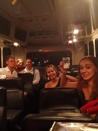 Happy People in Party Bus