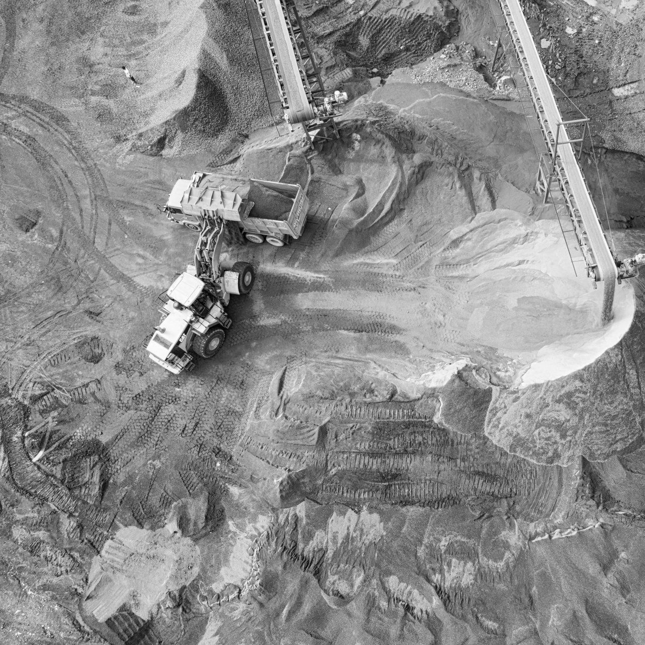 A black and white photo of a construction site