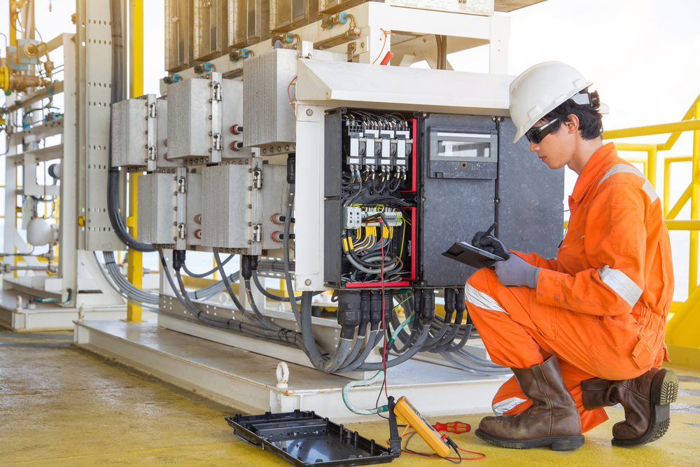 Electrical Maintenance Being performed By Worker — Barnes Electrical in Gladstone, QLD