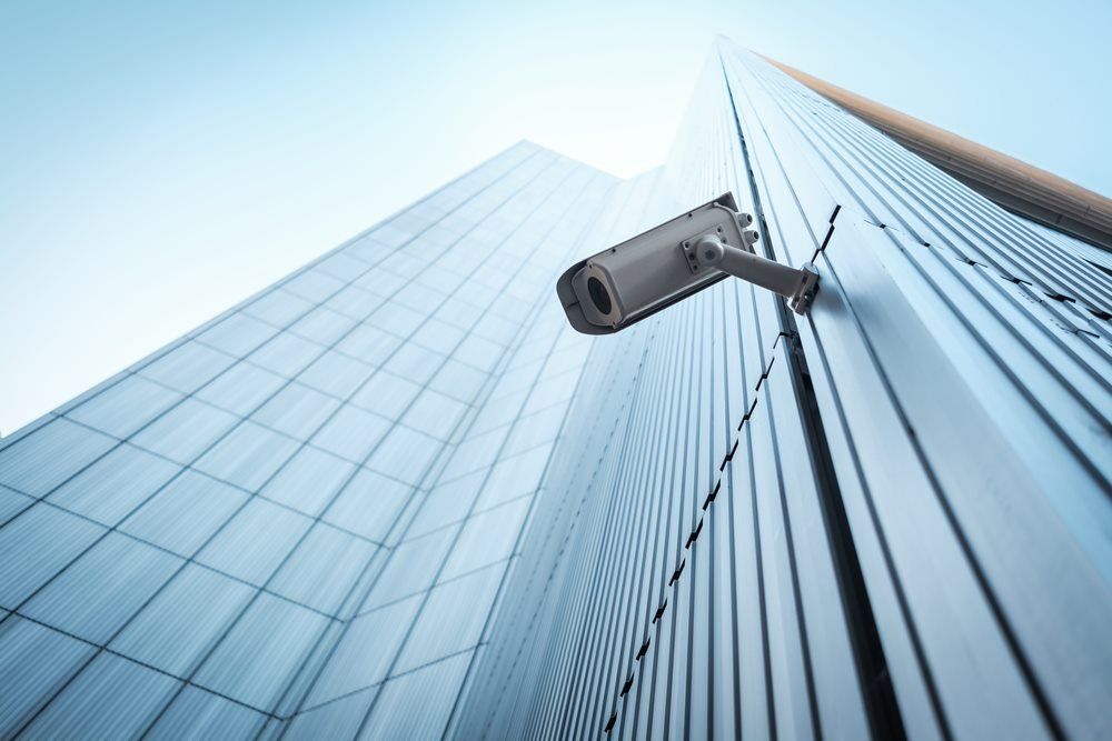 Outdoor CCTV Camera Installed On Build Wall In The City — Barnes Electrical in Gladstone, QLD