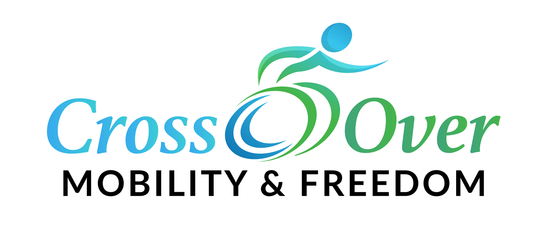 the logo for cross over mobility and freedom shows a person riding a bike .